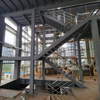 Prefabricated Steel Structure Hotel Building Warehouse Construction Steel Structure Warehouse Building with Steel Stairs