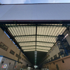 China Low-Cost Customized Industrial Workshop Metal Storage Warehouse Building Prefab Steel Frame Construction with Panels