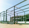 Low Price Steel Prefab Warehouse Structure Prefabricated Metal Factory Building Exhibition Hall Design Building Materials Q355B