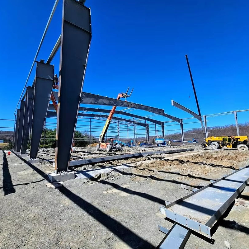 2025 New Factory Expansion Project Erecting Columns & Eave Struts with Framing Installation Underway Columns Girts Installed
