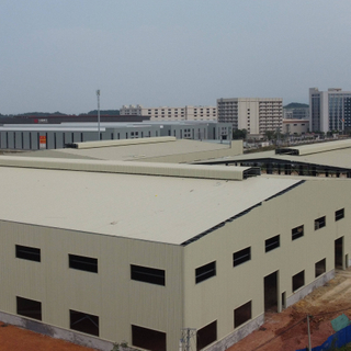 China Prefabricated Steel Structure Frame Industrial Workshop Factory Building Prefab Metal Warehouse Storage with Ridge Vent