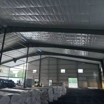 2025 Storage Expansion Warehouse Gable Trim Applied to the Completed Roof Slope Insulation Liner Added to Unfinished Roof Slope