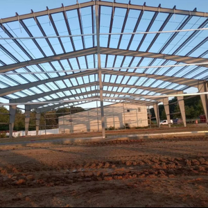 2025 Building Strong Foundations Workshop Steel Buildings X-Bracing Banding for Roof Insulation Is Being Installed Roof Sheeting