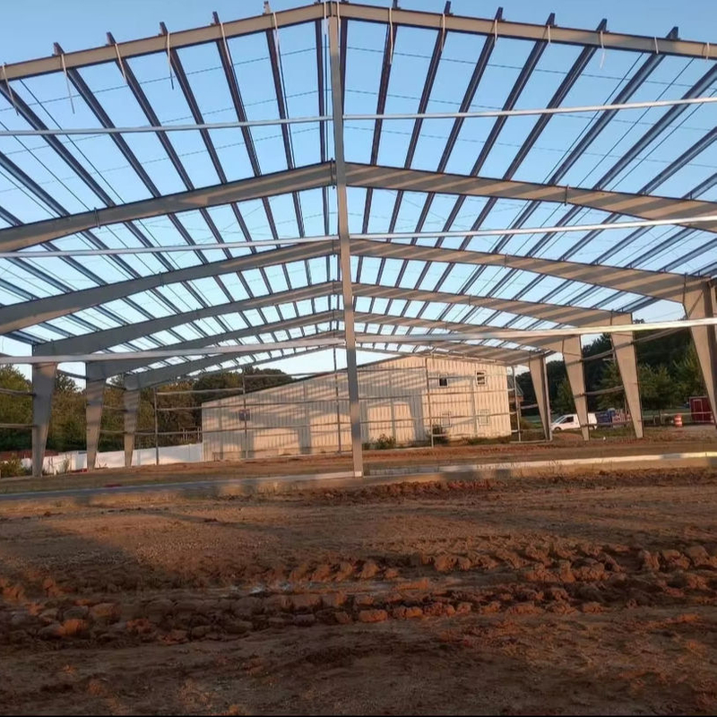 2025 Building Strong Foundations Workshop Steel Buildings X-Bracing Banding for Roof Insulation Is Being Installed Roof Sheeting