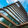 2025 Ully Glazed Corners of 12 Meters High Interrupt the Meandering Aluminium Canopies of Two Remarkable Office Towers