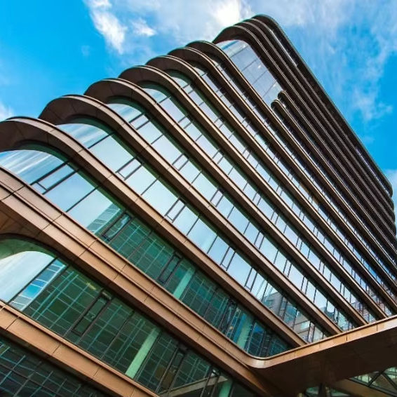 2025 Ully Glazed Corners of 12 Meters High Interrupt the Meandering Aluminium Canopies of Two Remarkable Office Towers