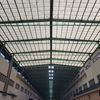 China Low-Cost Customized Industrial Workshop Metal Storage Warehouse Building Prefab Steel Frame Construction with Panels