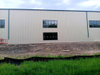 2025 Making Strides on Factory Workshop Project Adding Endwall Insulation Downspouts to Building Getting Closer to Completion