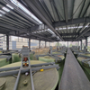 Prefabricated Steel Structure Hotel Building Warehouse Construction Steel Structure Warehouse Building with Steel Stairs