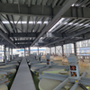 Prefabricated Steel Structure Hotel Building Warehouse Construction Steel Structure Warehouse Building with Steel Stairs