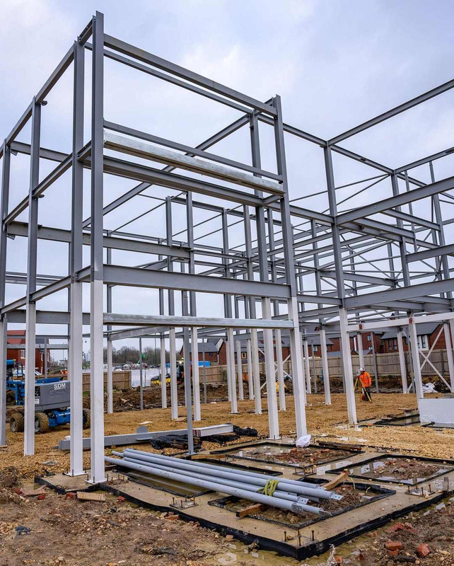 2025 Steel Structure Office Building Workshop Steelstructure New Co-op Flats Cross Beams Support the First and Second Floors