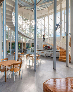 2025 White Structures Small Iron Pillars Resembling Trees Central Round Pillar That Supports the Building and Channels Rainwater