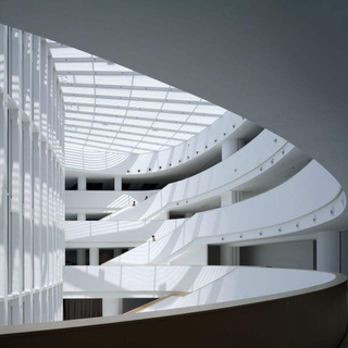 2025 Two Large Atriums 28-meter Steel Columns Glass Walls Let Daylight Space Create Open Connected Feel Throughout the Building