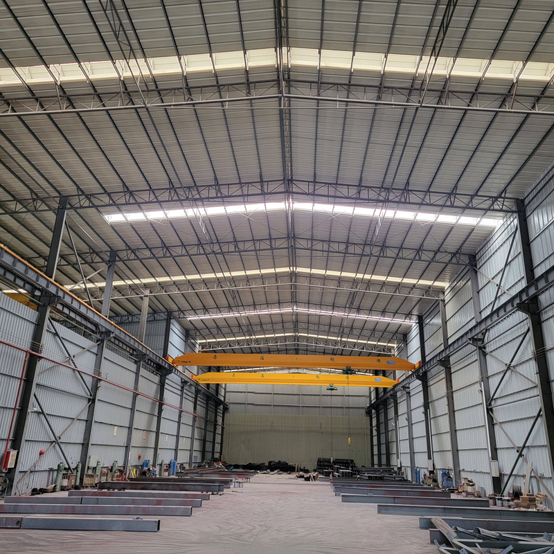 China Low-Cost Customized Industrial Workshop Metal Storage Warehouse Building Prefab Steel Frame Construction with Panels