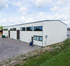 China Manufacturer Hot Dip Galvanized Light Metal Sloping Roof Steel Structure Commercial Building