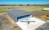 2025 Our Clients Passionate Aviation Enthusiasts Had a Vision for a Modern and Streamlined Exterior Facade for Aircraft Hangar