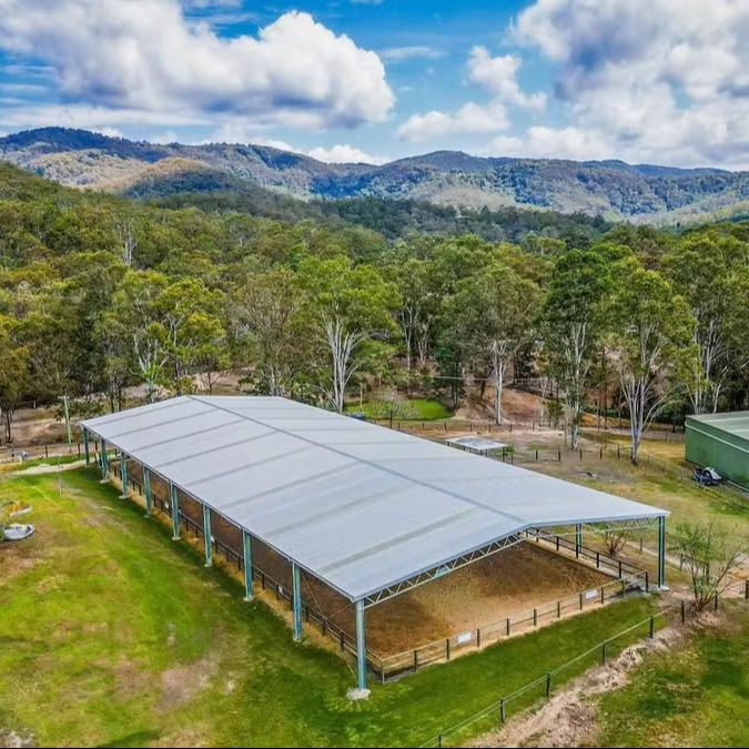 2025 in Consideration of Advancetown's Warm Weather Chose to Construct a Roof-only Cover for Their Olympic-sized Horse Arena