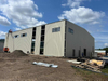 2025 Exciting Progress on Our 100x125 Hangar Most of the Primary and Secondary Framing Is in Place Installing Roof Sheeting Now