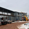 2025 the Airport Structure Is Complete, and Work Is Underway on Exterior Envelope Scopes, Including Metal Roofing and Paneling