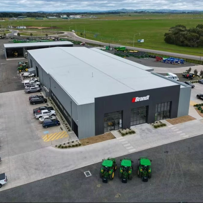 2025 the Layout Included a Showroom Workshop Office Space Staff Amenities and Wash Bay Parking Outdoor Displays and Landscaping