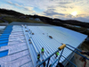 2025 Warehouse Expansion Update the Roof Sheeting Two Bays Left Ridge Caps Are Being Added and Sidewall Sheeting Is Underway