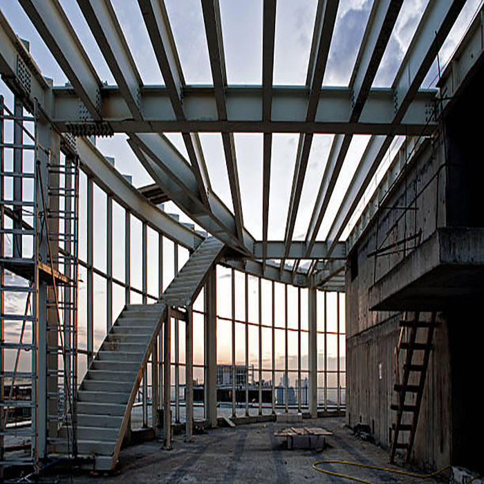 2024 Prefab Hot Dip Galvanized Steel Frame House Prefab Steel Structure Steel Warehouse with Checkered Plate Stairs