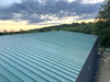 2025 Storage Expansion Warehouse Gable Trim Applied to the Completed Roof Slope Insulation Liner Added to Unfinished Roof Slope