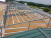 2025 Building Strong Foundations Workshop Steel Buildings X-Bracing Banding for Roof Insulation Is Being Installed Roof Sheeting