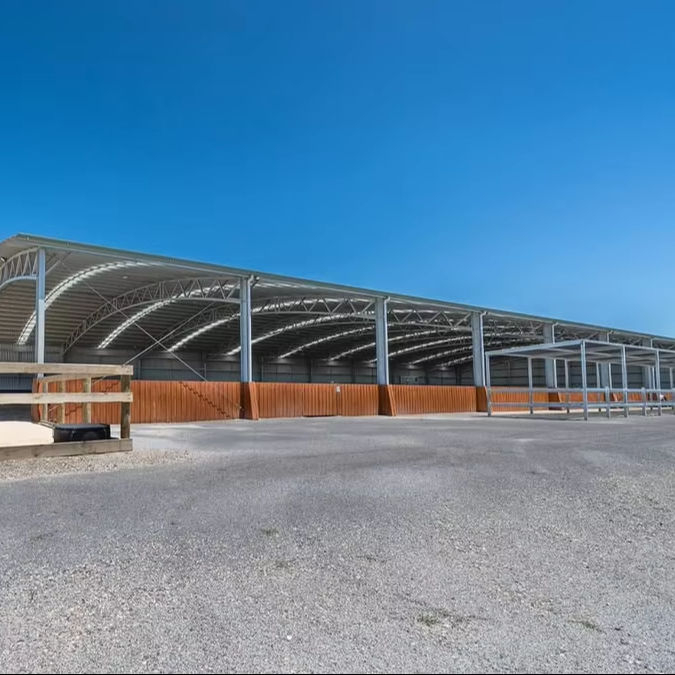 2025 This Is Custom-built Indoor Riding Arena Designed to Cater to Cowboy Dressage Reining and Other Western Riding Disciplines