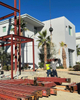 2025 Steel Structure Office Building Building High Into the Sky at the Thermal Club Comes to Lifting Structural Steel Beams