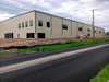 2025 Making Strides on Factory Workshop Project Adding Endwall Insulation Downspouts to Building Getting Closer to Completion