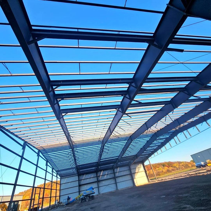 2025 Airplane Hanger Vertical Hangar Beams Purlin Bridging Being Installed Wall Sheeting Hangar Vertical System 200x125 Building