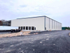 2025 Makin' Moves on Factory Workshop Project Wall Sheeting on One Wall Storefront Doors and Glass Going in Along with Windows