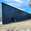 2025 Steel Building Progress All Insulation Roof Snow Guards Installed Putting the Finishing Touches on Trim & Window Details