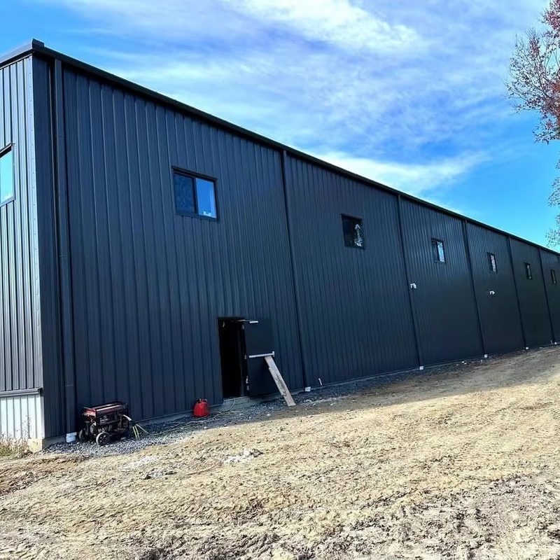 2025 Steel Building Progress All Insulation Roof Snow Guards Installed Putting the Finishing Touches on Trim & Window Details