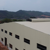 China Prefabricated Steel Structure Frame Industrial Workshop Factory Building Prefab Metal Warehouse Storage with Ridge Vent