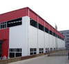 Low Price Steel Prefab Warehouse Structure Prefabricated Metal Factory Building Exhibition Hall Design Building Materials Q355B
